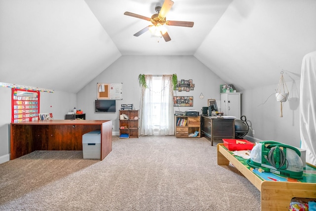 carpeted office featuring ceiling fan and lofted ceiling