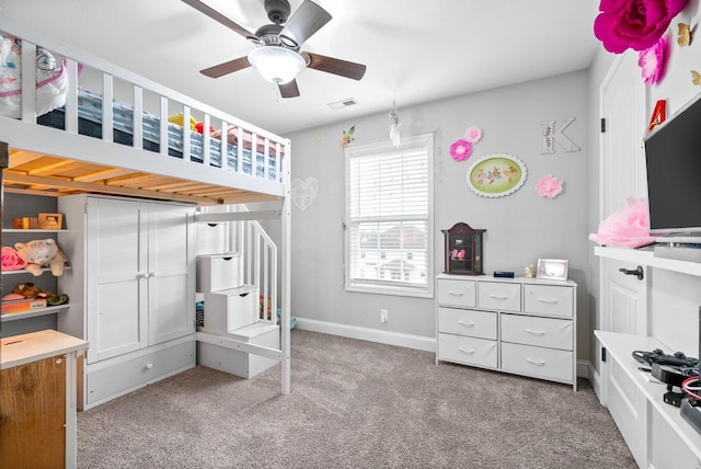 carpeted bedroom with ceiling fan