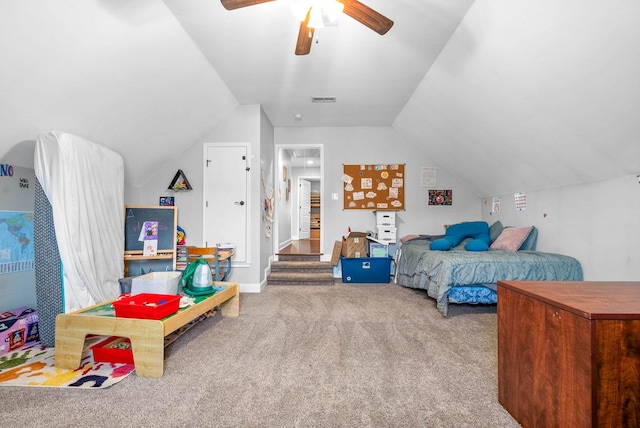 bedroom with carpet flooring, ceiling fan, and vaulted ceiling