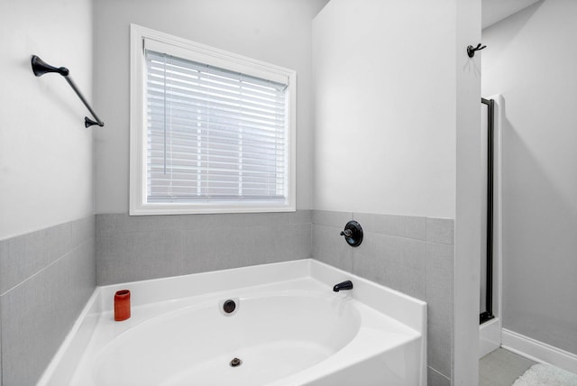 bathroom featuring a bathing tub