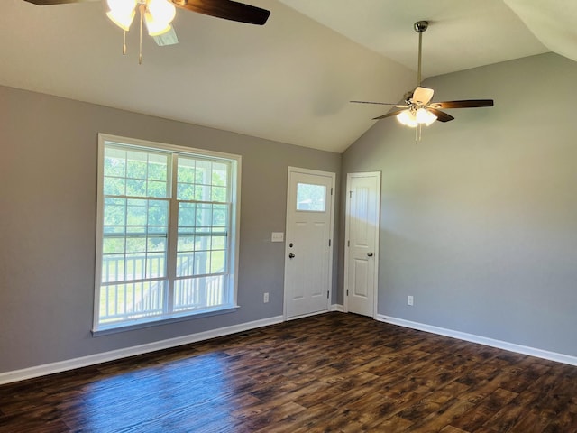 interior space with dark hardwood / wood-style floors, ceiling fan, and lofted ceiling