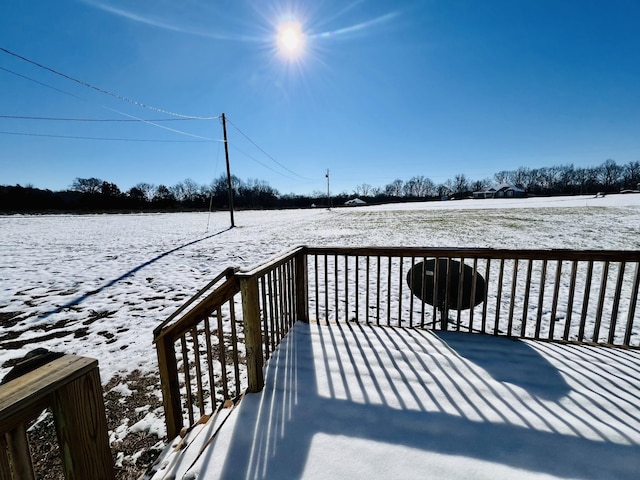 view of snow covered deck