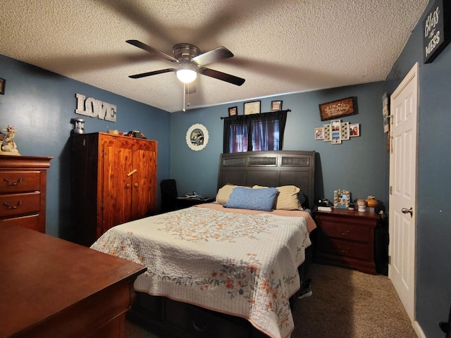 carpeted bedroom with a textured ceiling and ceiling fan