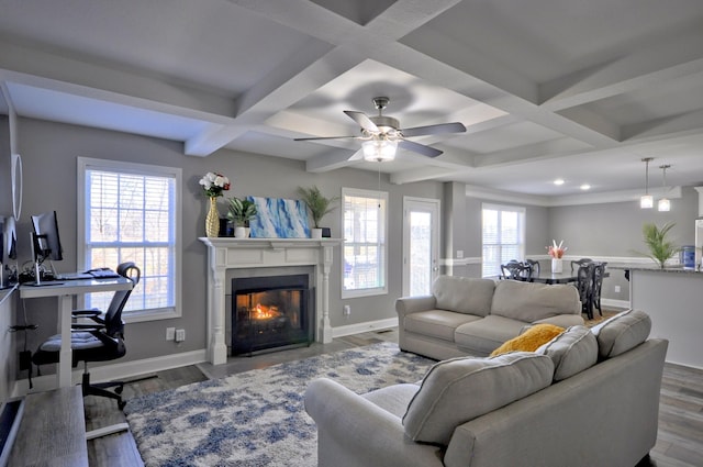 living room featuring beamed ceiling, coffered ceiling, hardwood / wood-style floors, and ceiling fan