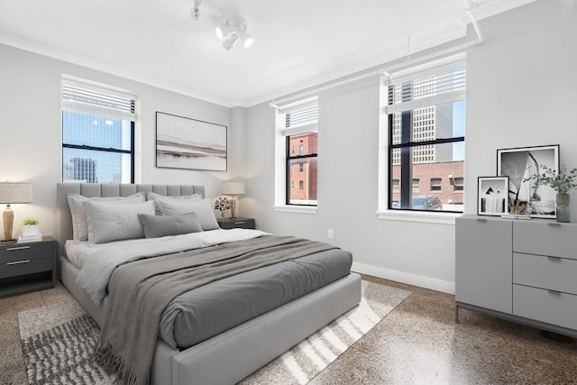 bedroom with ornamental molding