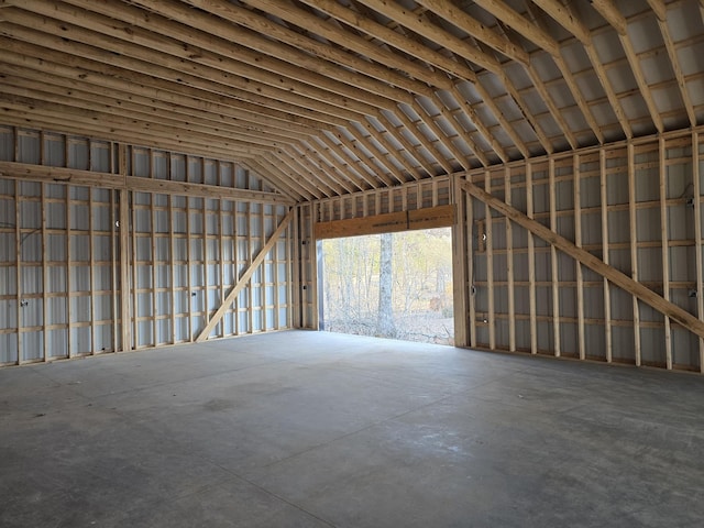 miscellaneous room featuring lofted ceiling