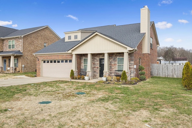 craftsman-style home featuring covered porch, a garage, and a front yard