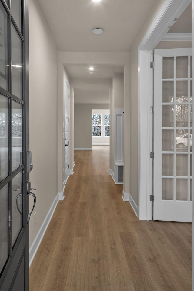 hallway featuring hardwood / wood-style floors