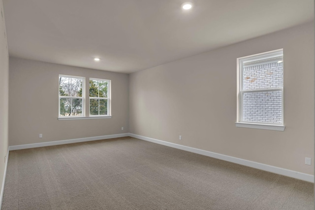 view of carpeted spare room