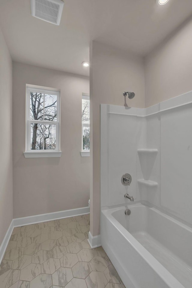 bathroom featuring shower / bath combination