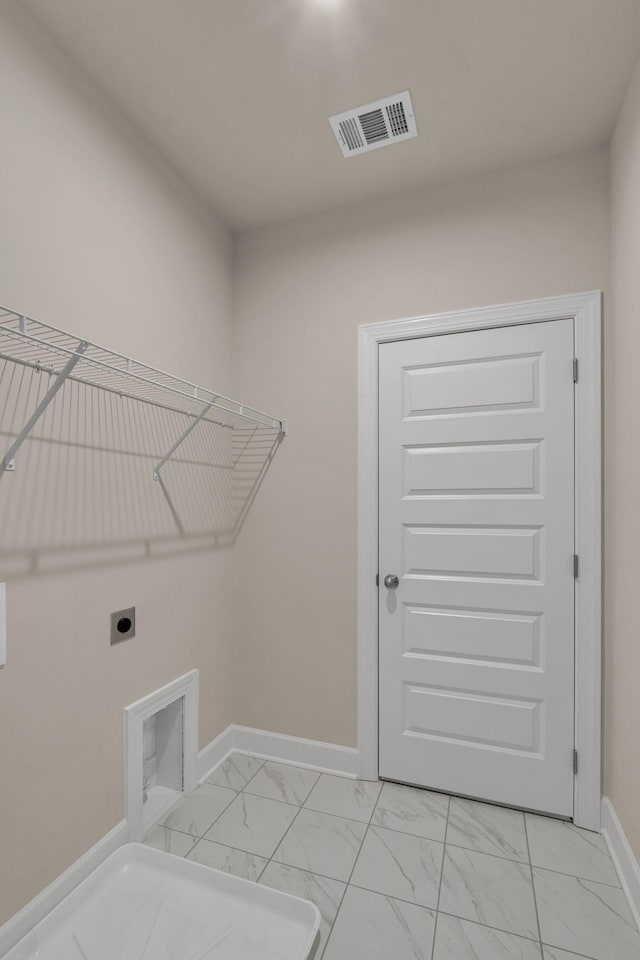 laundry room featuring electric dryer hookup