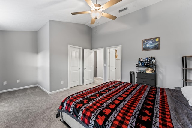 carpeted bedroom featuring ceiling fan and lofted ceiling