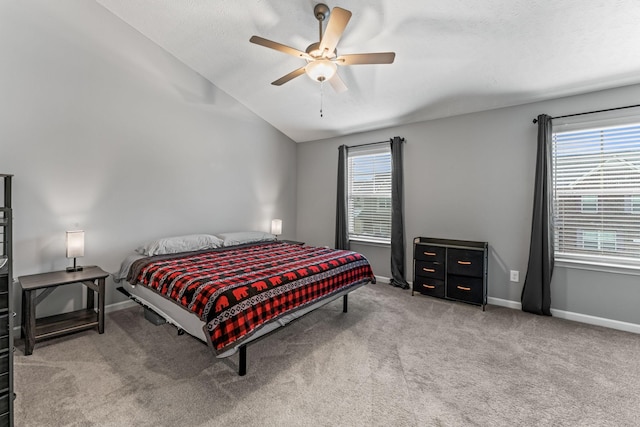 bedroom featuring carpet flooring, ceiling fan, and vaulted ceiling