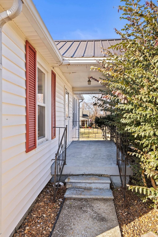 entrance to property featuring a porch