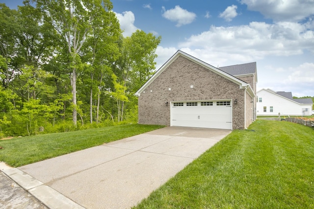 view of home's exterior featuring brick siding and a lawn