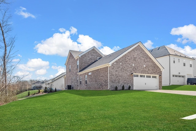 view of side of property featuring central AC unit, an attached garage, brick siding, driveway, and a lawn