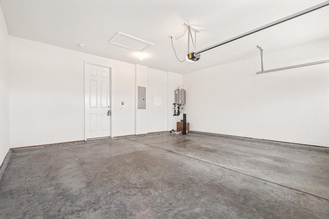 garage with electric panel, water heater, and a garage door opener