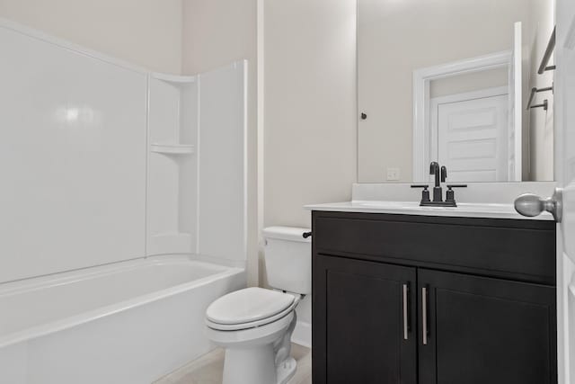 bathroom featuring shower / washtub combination, vanity, and toilet