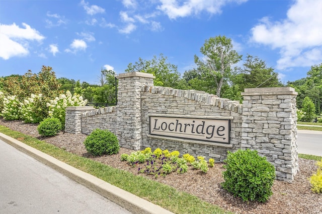 view of community sign