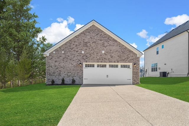 exterior space featuring a yard, central AC unit, and brick siding