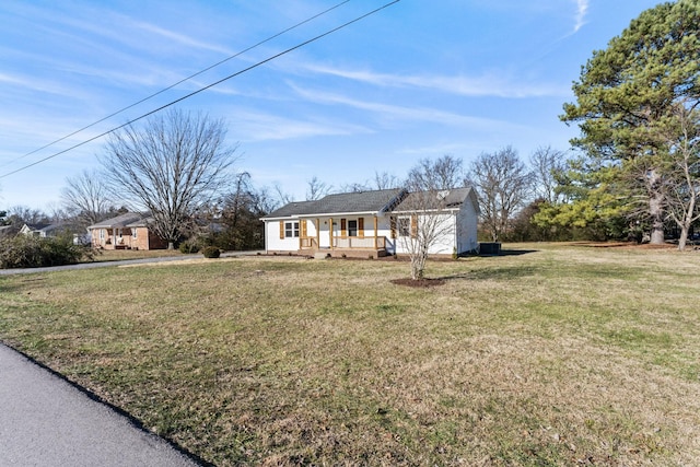 single story home featuring a porch and a front yard