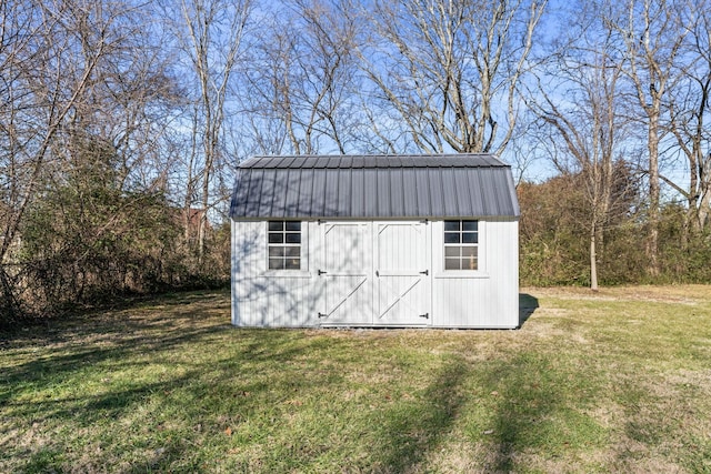 view of outdoor structure with a yard