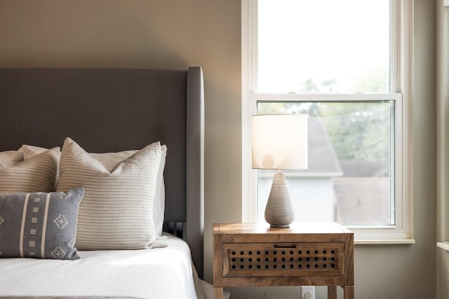 bedroom featuring multiple windows