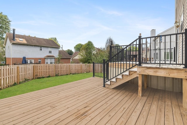 wooden deck with a yard