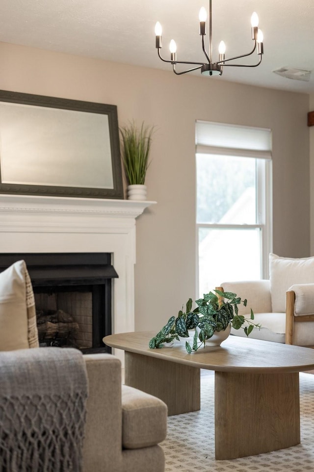 living room featuring an inviting chandelier