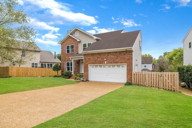 view of front of home with a front yard and a garage