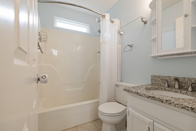 full bathroom with tile patterned flooring, vanity, toilet, and shower / bath combo with shower curtain