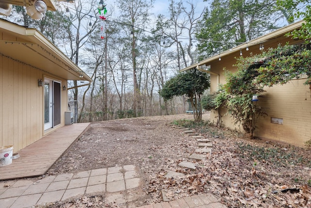 view of yard featuring a deck