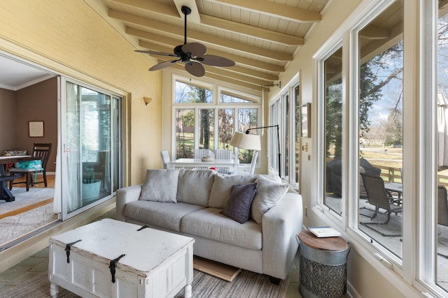 sunroom with wood ceiling, ceiling fan, and lofted ceiling with beams