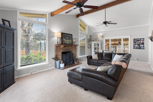 living room with light carpet, vaulted ceiling with beams, ceiling fan, and a fireplace