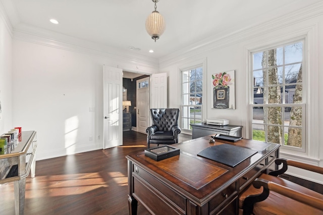 office area with dark wood-type flooring, a wealth of natural light, and ornamental molding