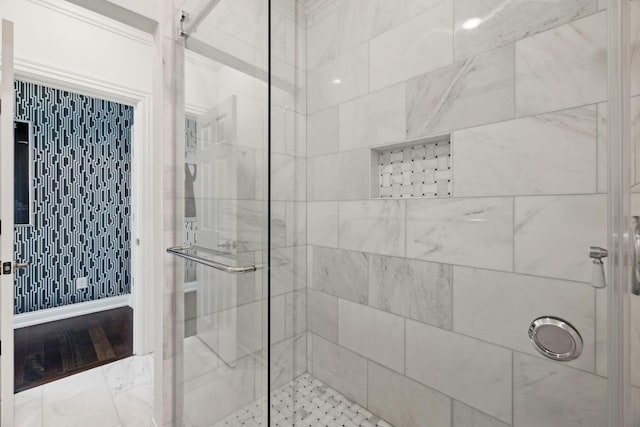 bathroom featuring an enclosed shower