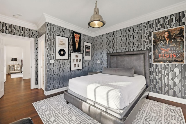 bedroom featuring dark wood-type flooring and crown molding