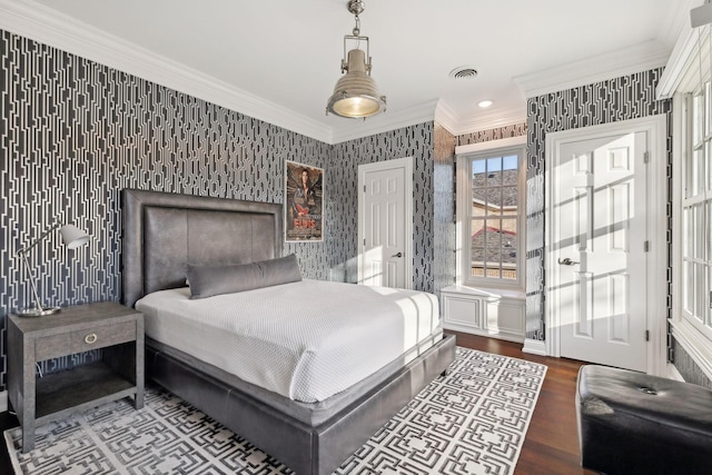 bedroom with dark wood-type flooring and ornamental molding