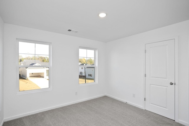 view of carpeted spare room