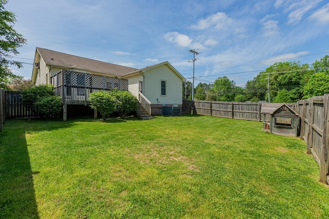 view of yard featuring a deck