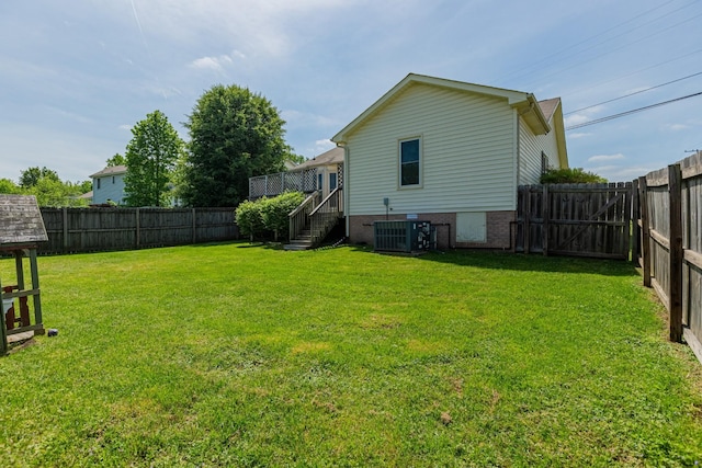 view of yard featuring central AC unit