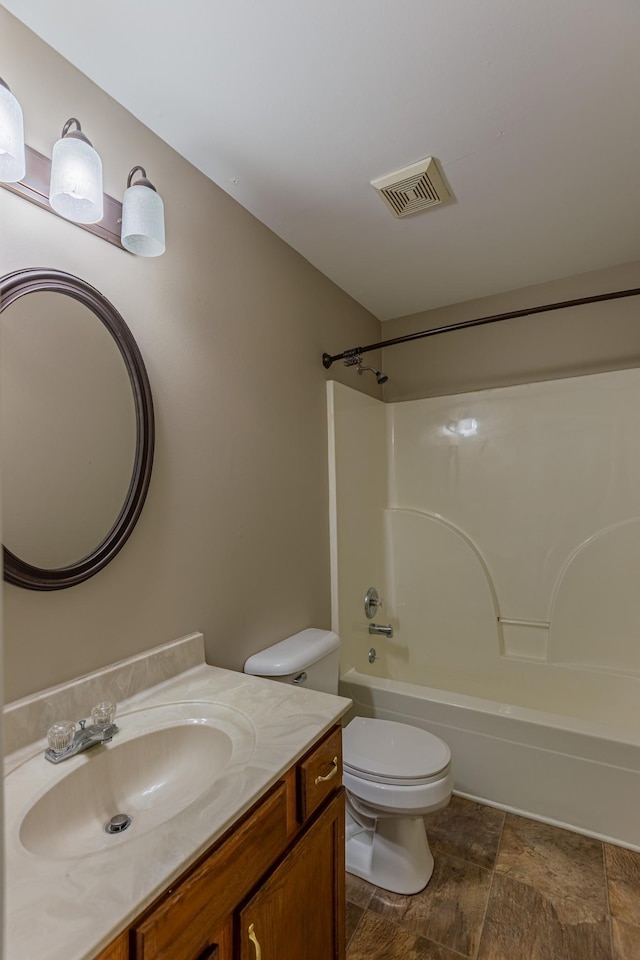 full bathroom with toilet, shower / bath combination, and vanity