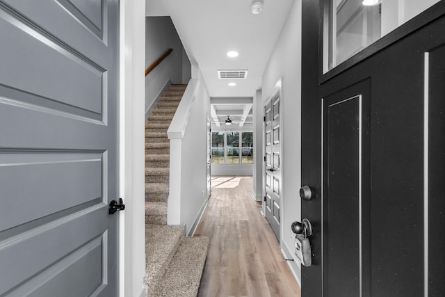 hallway featuring light wood-type flooring