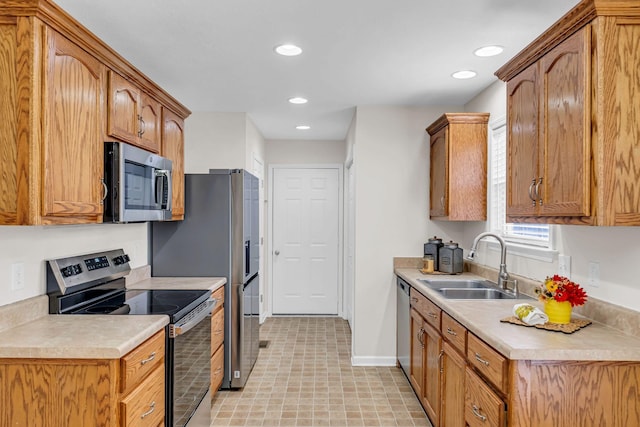 kitchen with appliances with stainless steel finishes and sink