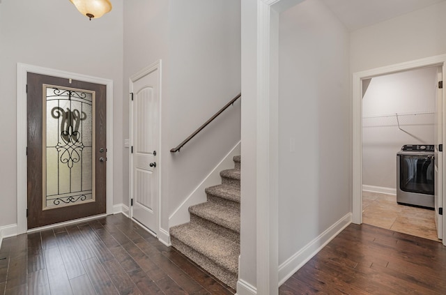 foyer entrance featuring dark hardwood / wood-style flooring