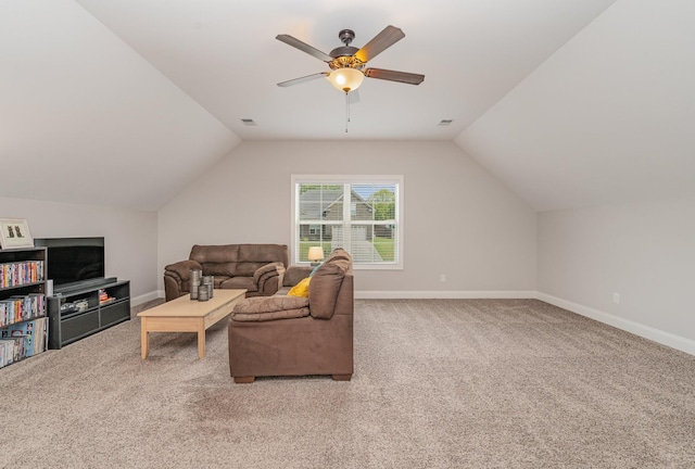 carpeted living room featuring vaulted ceiling and ceiling fan