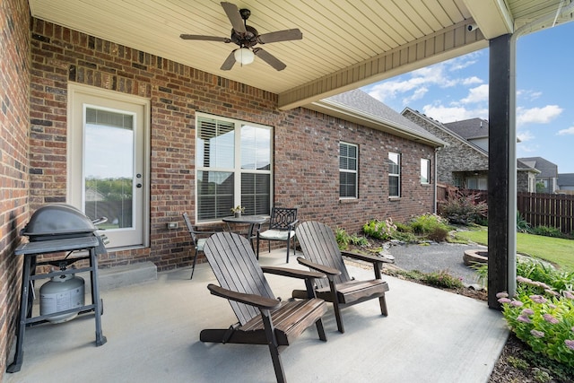 view of patio featuring grilling area and ceiling fan