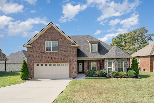 view of front facade with a front lawn and a garage