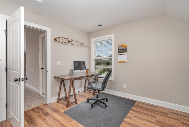 home office featuring hardwood / wood-style flooring