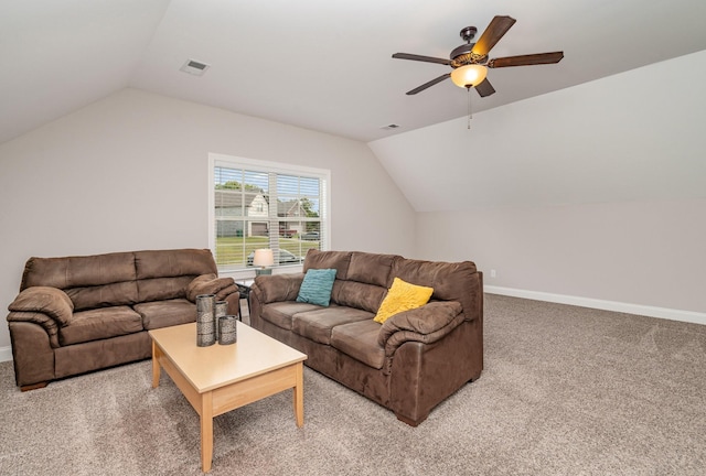 living room featuring ceiling fan, carpet floors, and vaulted ceiling